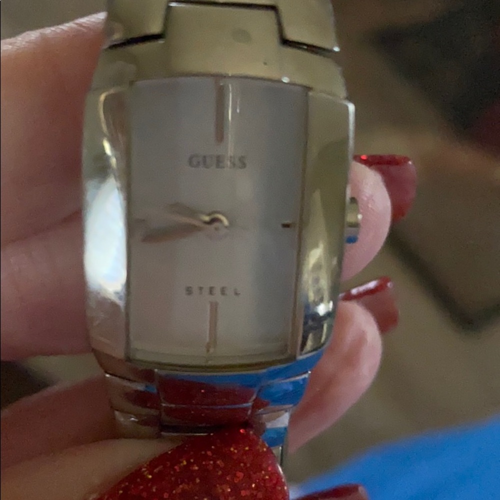 Guess silver watch with very few marks !